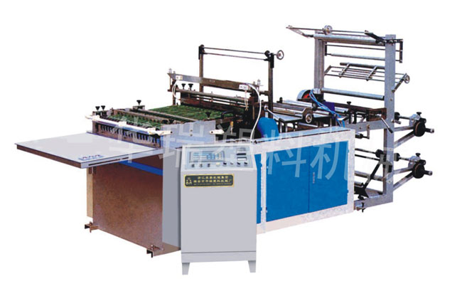 Side sealing bag making machine